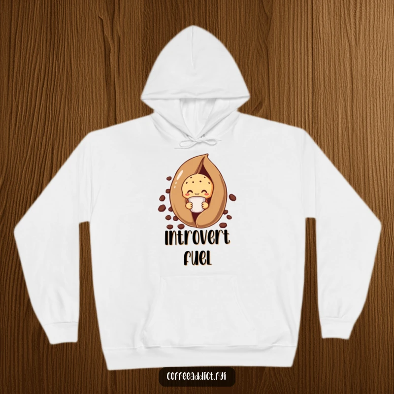Funny shy muffin hoodie featuring a muffin peeking from behind a giant coffee bean, holding a tiny cup.
